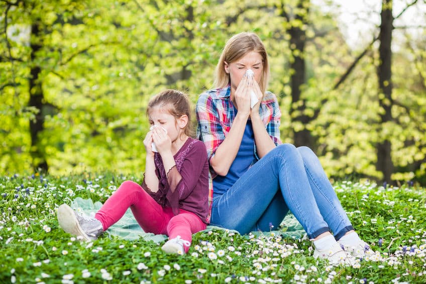 mom and daughter with running nose