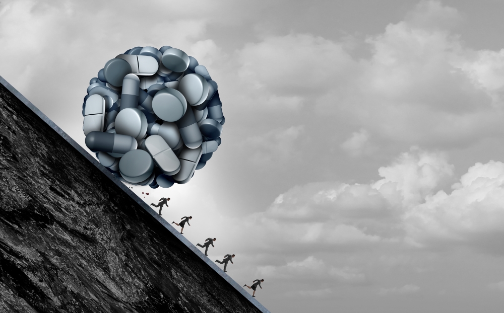 Opioid crisis and prescription painkiller addiction epidemic concept as a group of people running away from dangerous pills as a medical addict problem with 3D illustration elements.